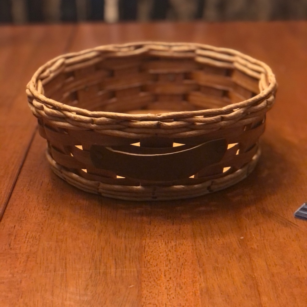 This Vintage Pyrex Woven Basket and Cork bottom